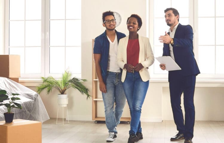 Real Estate Agent Meeting Couple